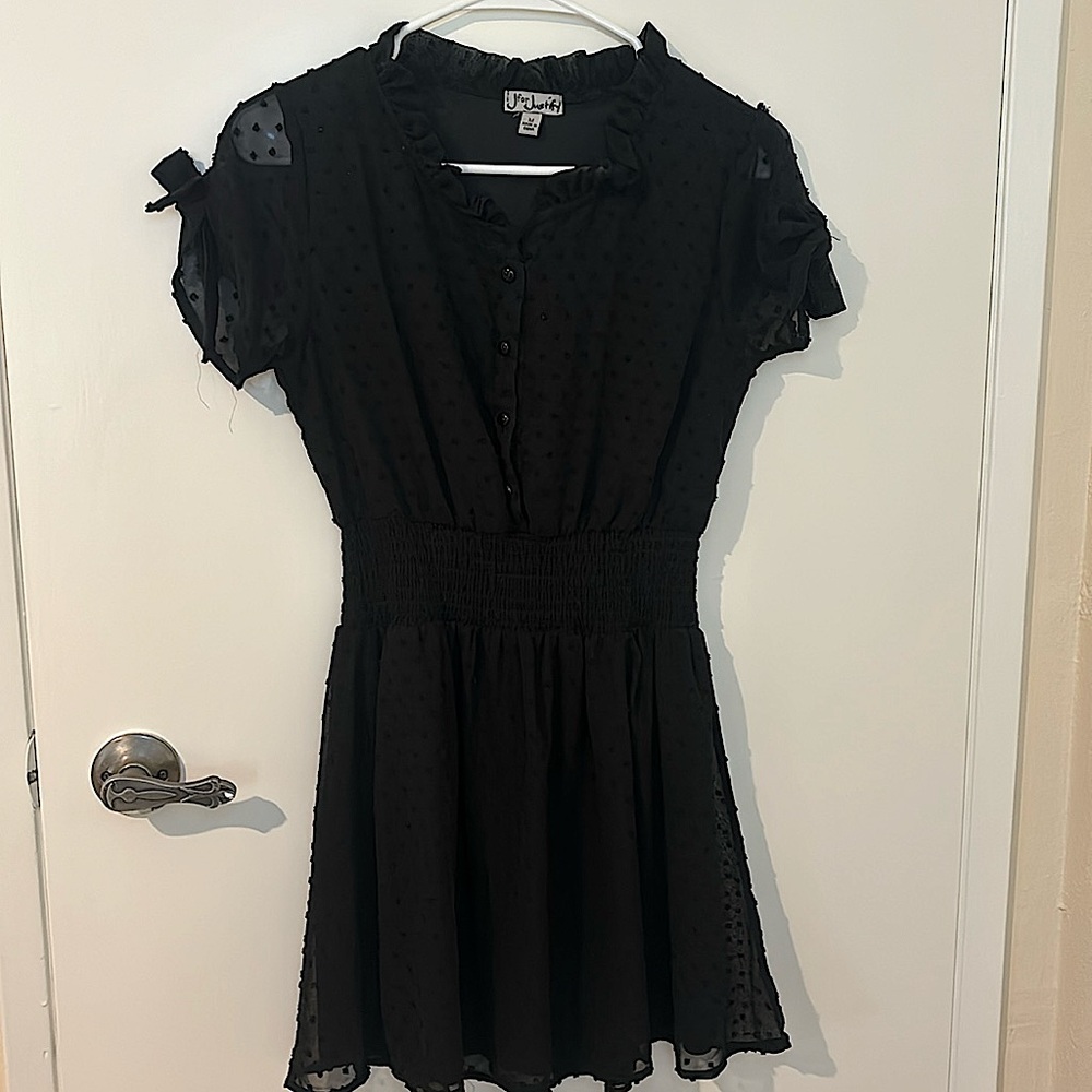 J for Justify black mini dress with black textured details.